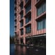 Pink Fluted Concrete Apartments Image 4