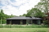 Black-Timber Overhanging Roof Buildings Image 2