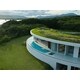 Green Roof-Topped Circular Villas Image 1
