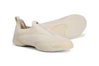 Collaborative Sleek Sneaker Model Image 4