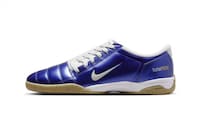 Sleek Iridescent Soccer Shoes Image 1