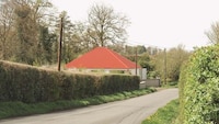 Red Roof-Topped Irish Buildings Image 1