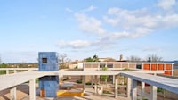 Patio-Centering Villa Designs Image 1