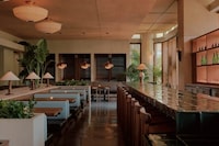 Tropical Brutalist Dining Image 2