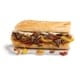 Ingredient-Packed Cheesesteak Sandwiches Image 1