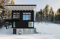 Elevated Forest Cabins Image 1