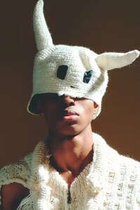 Hand- Knitted Joint Apparel Image 3