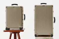 Warmly-Hued Metallic Suitcases Image 3