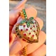 Whimsical Heirloom-Quality Symbolic Talismans Image 3