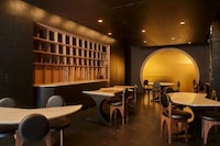 Stealthy Circular Dining Interiors Image 2