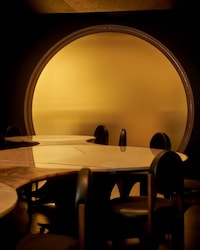 Stealthy Circular Dining Interiors Image 3