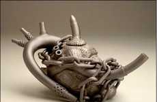 Darkly Sculpted Teapots