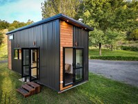 Demure Dual-Door Tiny Homes Image 1