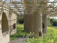 Cave-Like Wetland Discovery Pavilions Image 2