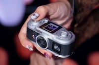 Palm-Sized Instant Cameras