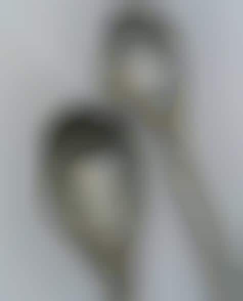 Artful Slotted Spoons