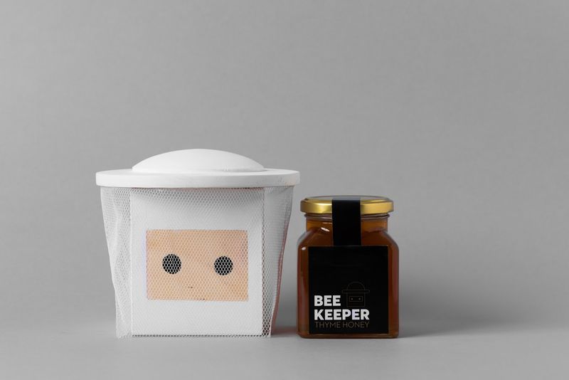 Beekeeper-Inspired Honey Packaging