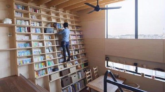 Leaning Book-Filled Homes