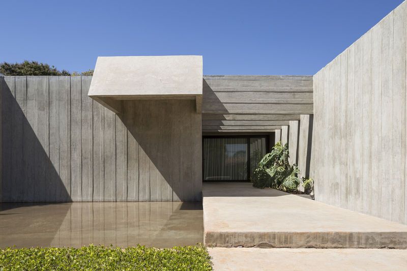 Low-Slung Blocky Concrete Homes