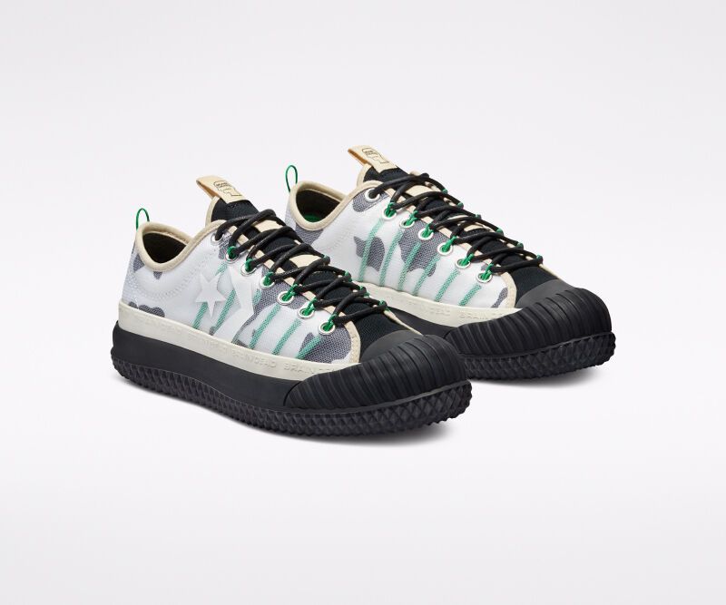 Elevated Cow Print Sneakers