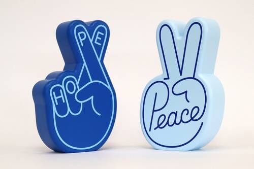 Peace-Themed Wood Sculptures