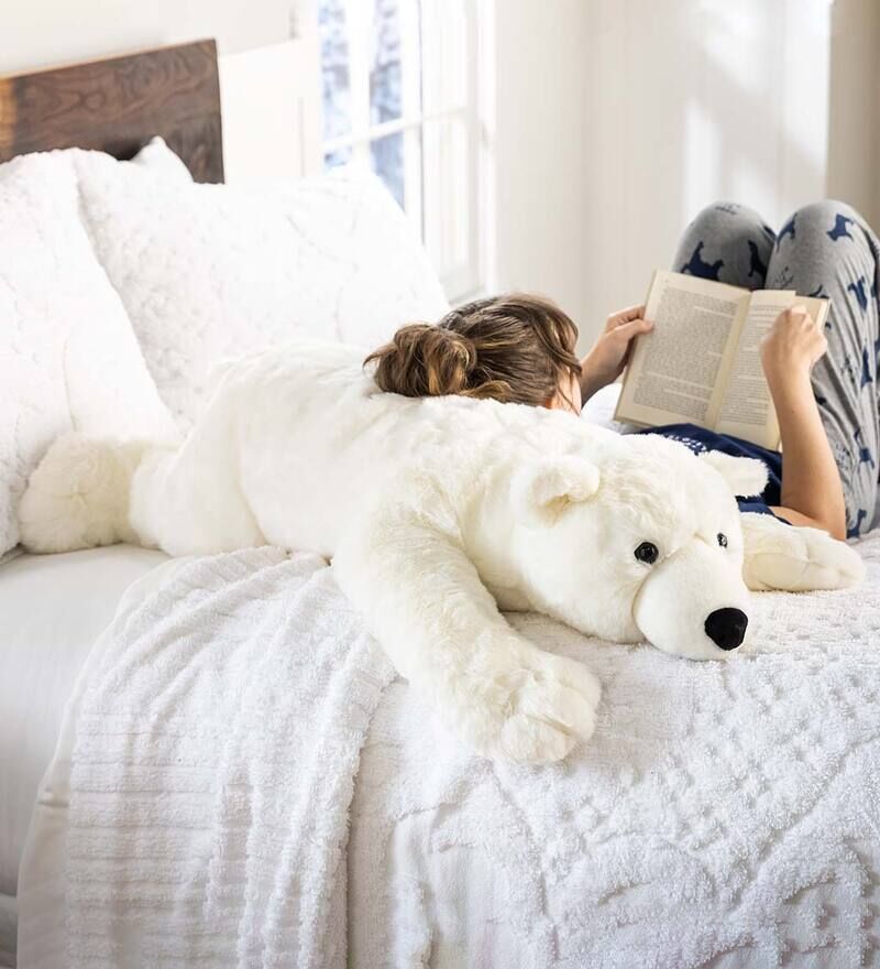 https://cdn.trendhunterstatic.com/thumbs/469/polar-bear-oversized-plush-cuddle-animal-body-pillow.jpeg?auto=webp
