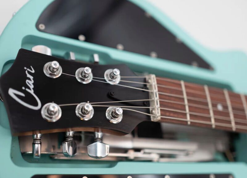 Dual-Hinge Folding Guitars