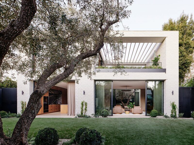 Olive Tree-Centric Wooden Homes