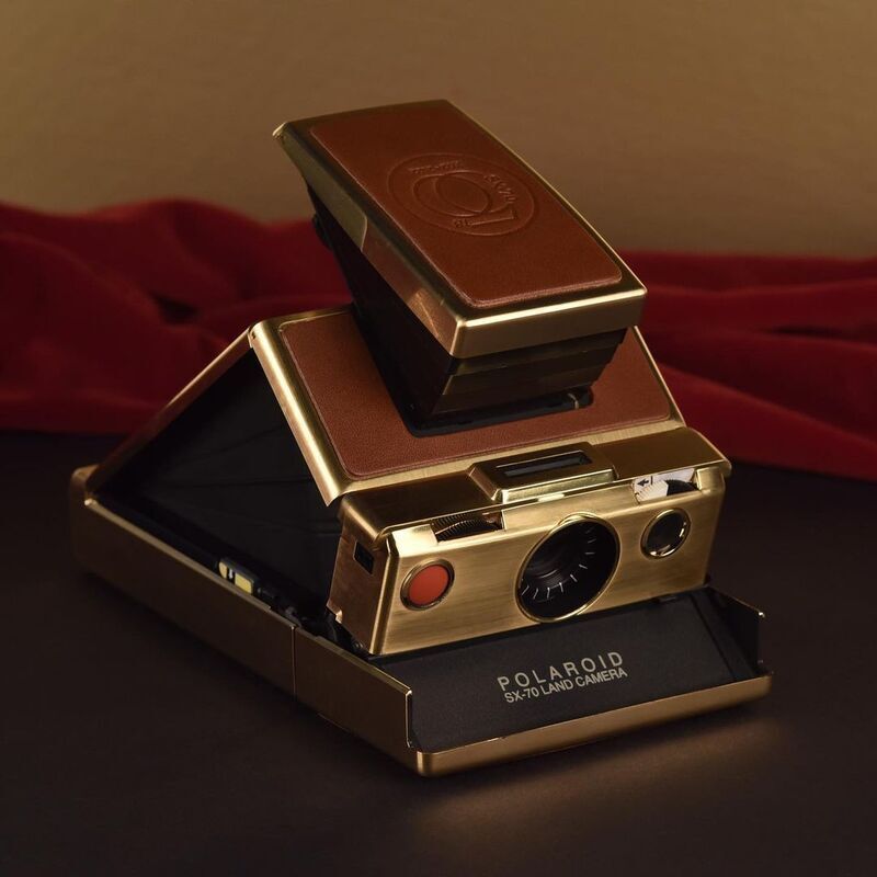Solid Gold Instant Cameras
