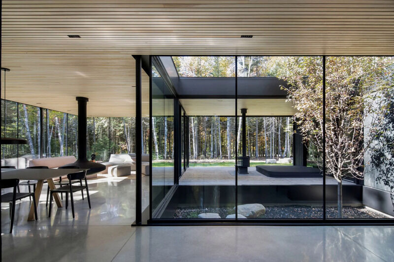 Apple Tree-Surrounding Glass Homes