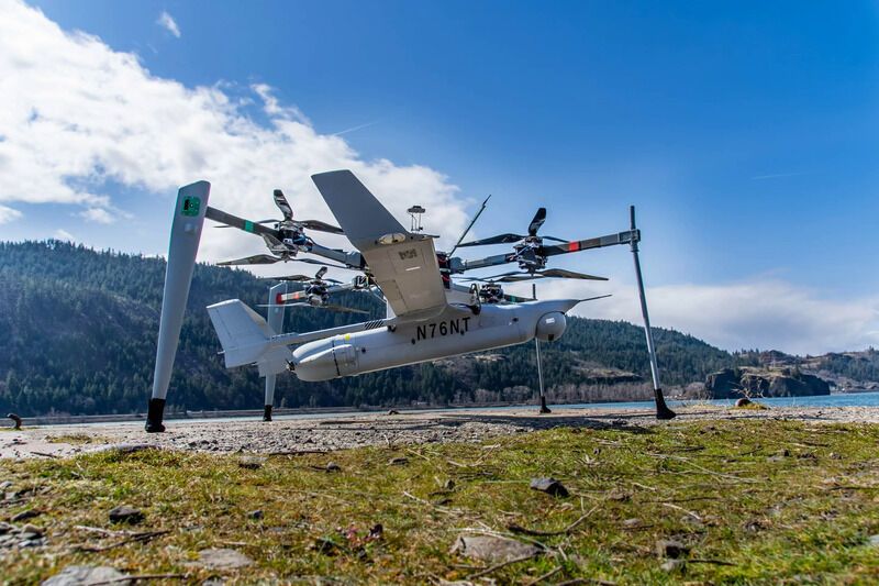 VTOL-Supporting Drone Systems