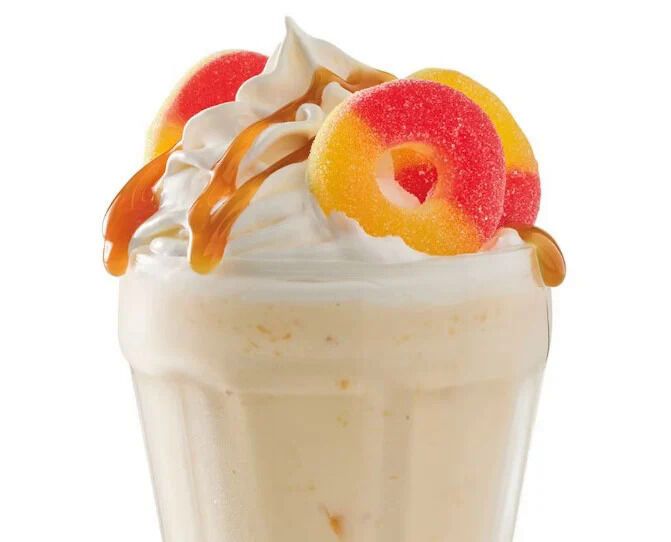 Creamy Peach Puree Shakes - Red Robin's New Peaches &amp; Cream Milkshake is Topped with Peach Gummies (TrendHunter.com)