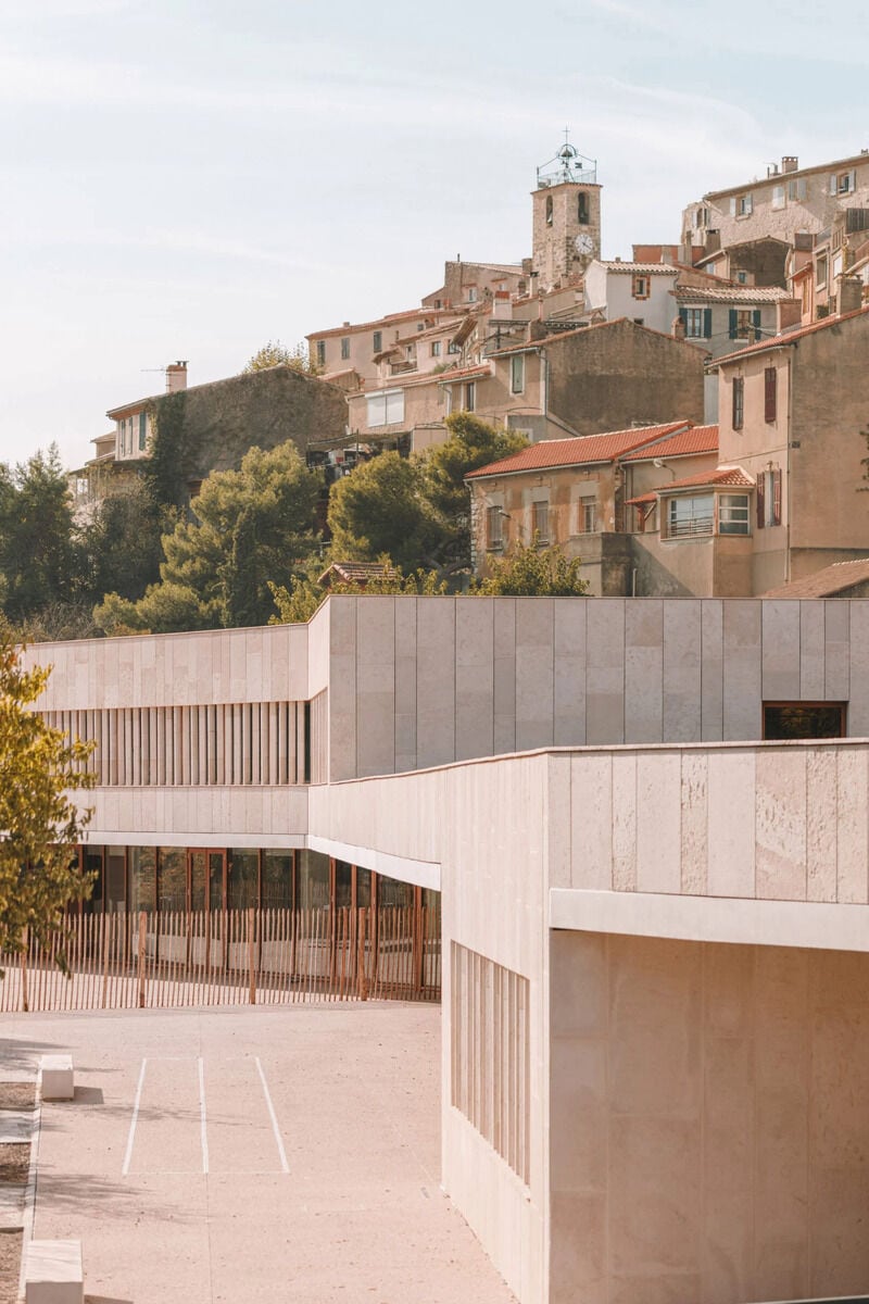 Low-Lying Limestone-Clad Schools