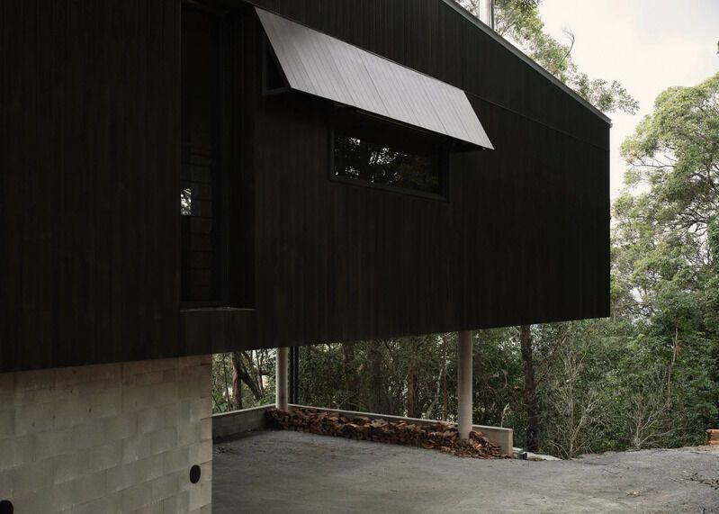 Angular Black Cantilevered Homes