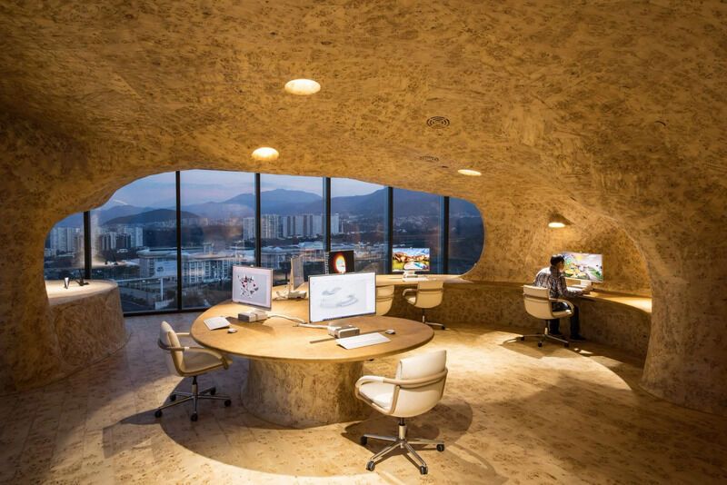 Illuminated Cave-Like Offices