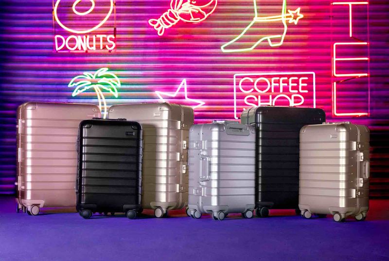 away purple luggage