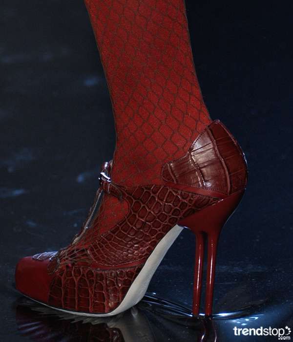 Double Heel Stiletto- Jean Paul Gaultier's haute couture FAll Winter 2010-11 presents a subverted fe
